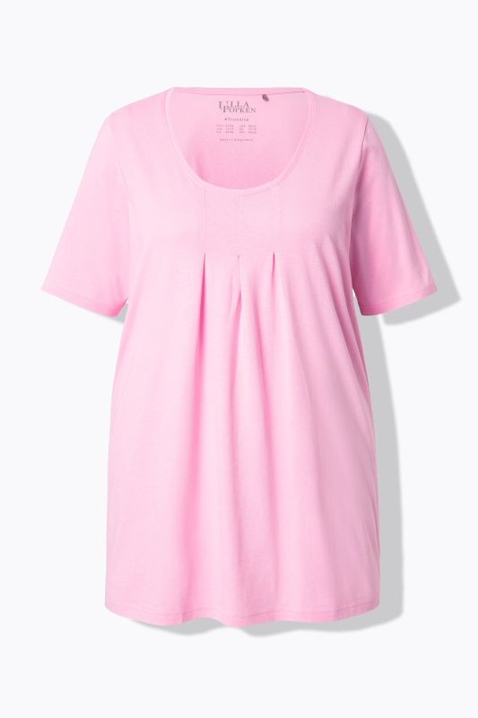 T-shirt en modal. Plis fantaisie, col rond et manches courtes. Coupe évasée