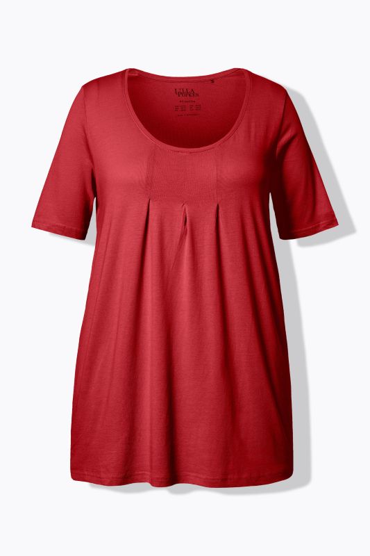 T-shirt en modal. Plis fantaisie, col rond et manches courtes. Coupe évasée