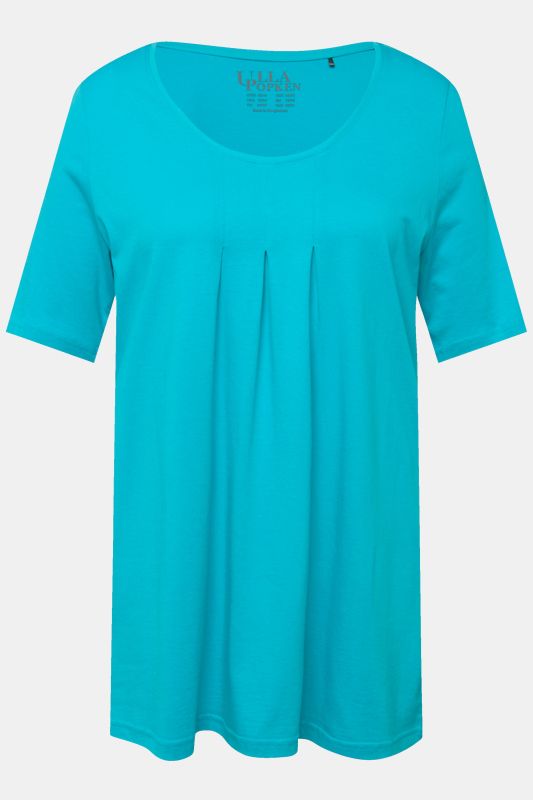T-shirt en modal. Plis fantaisie, col rond et manches courtes. Coupe évasée