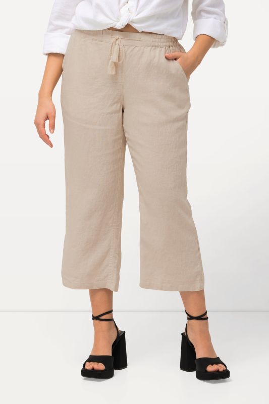 Pantalon 7/8 en lin, naturellement respirant. Taille élastique
