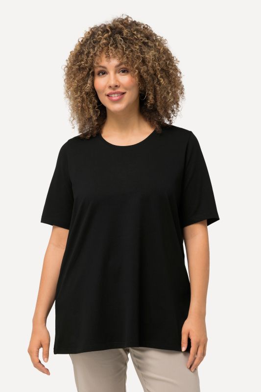 T-shirt en coton bio. Col rond et manches courtes. Coupe évasée
