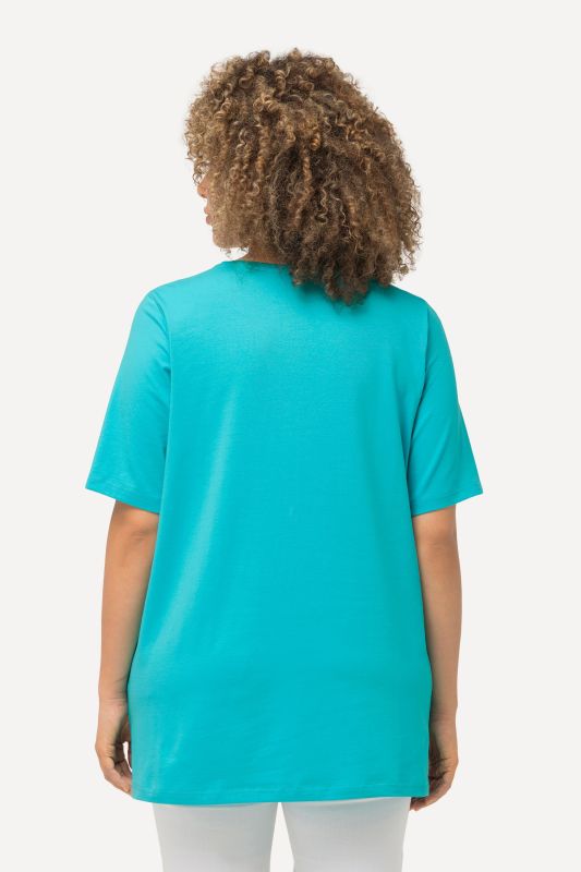 T-shirt en coton bio. Col rond et manches courtes. Coupe évasée