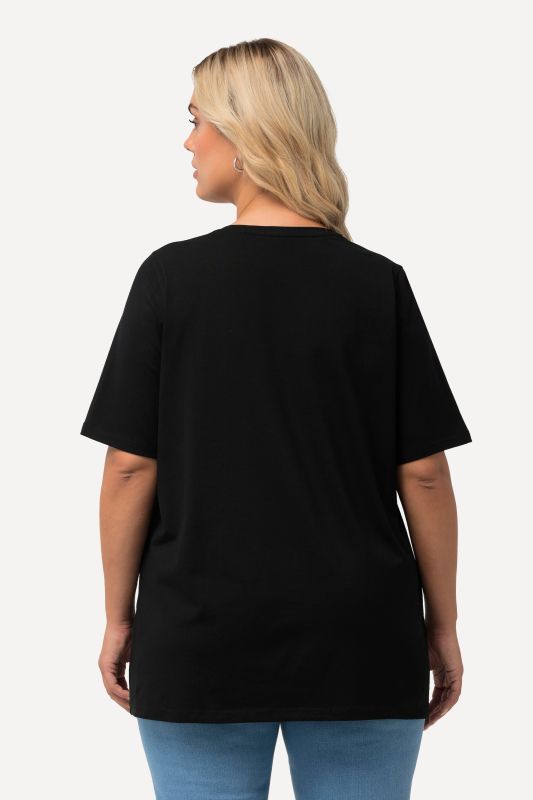 T-shirt à coupe évasée. Décolleté en V et manches courtes