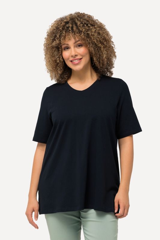 T-shirt à coupe évasée. Décolleté en V et manches courtes
