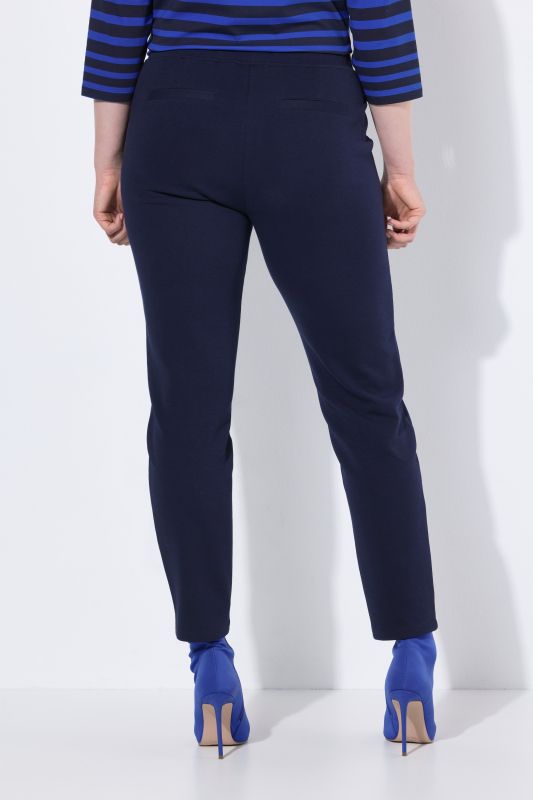 Pantalon point de Rome, jambe carotte. Taille élastique, plis fantaisie
