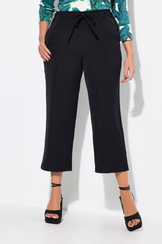 Pantalon 7/8 à pinces. Taille élastique