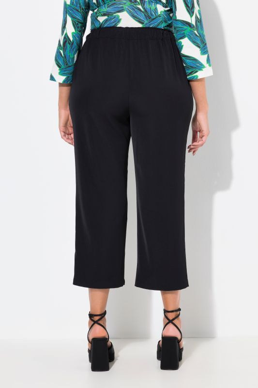 Pantalon 7/8 à pinces. Taille élastique