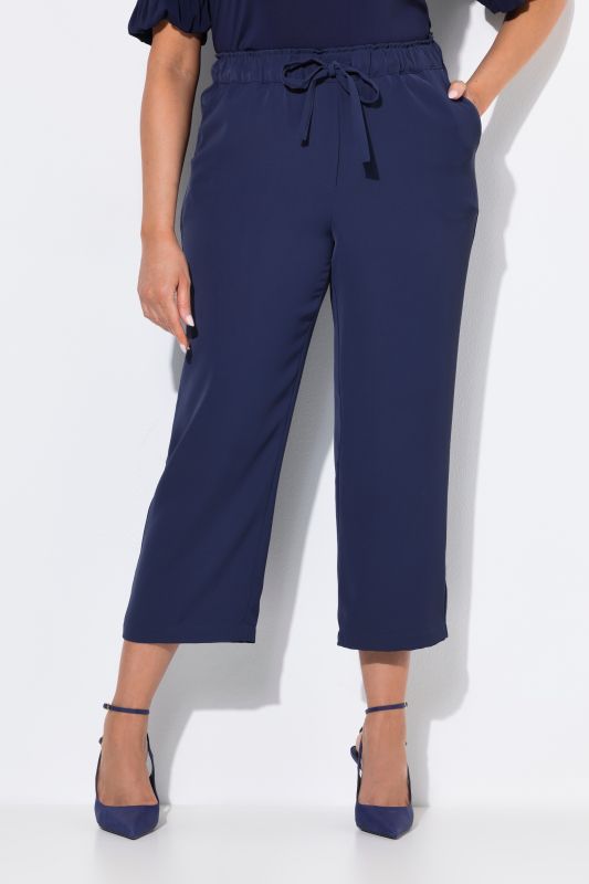 Pantalon 7/8 à pinces. Taille élastique