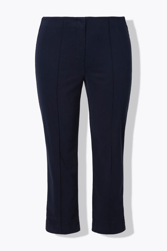 Pantalon, jambe slim. Taille élastique. Plis fantaisie. Petites fentes aux chevilles