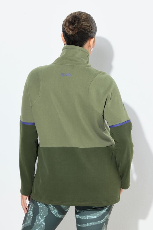 Veste en molleton bicolore à col montant, poches zippées