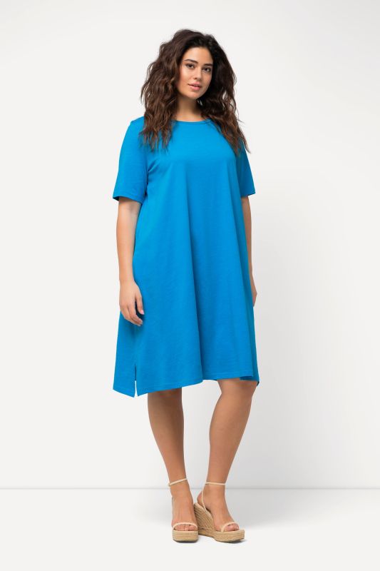 Robe en jersey avec poches, coupe évasée, col rond et manches courtes