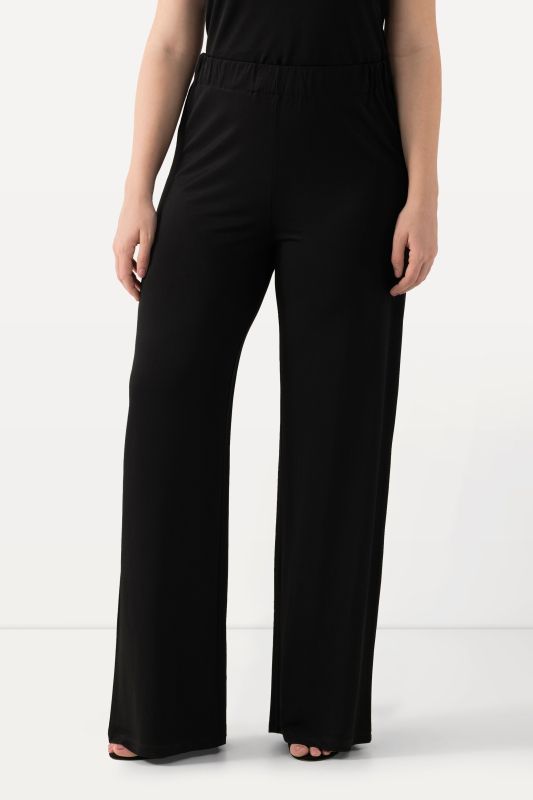 Pantalon en piqué au tombé fluide, jambe large et taille élastique