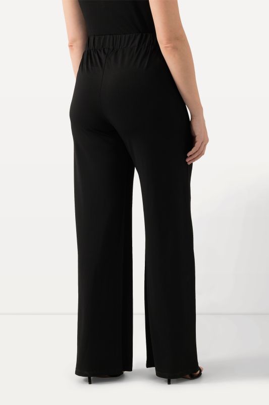 Pantalon en piqué au tombé fluide, jambe large et taille élastique