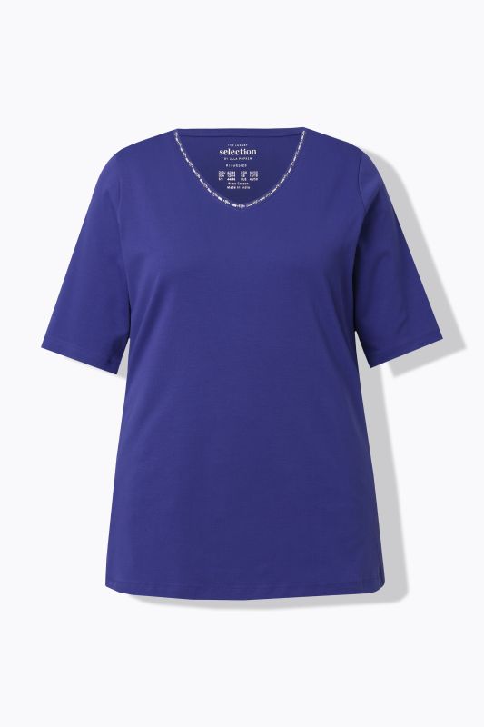T-shirt à coupe évasée. Col en V et manches courtes