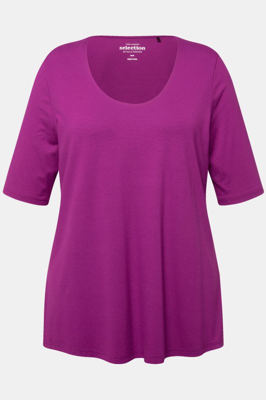T-shirt à col V et manches courtes. Doublé sur le devant