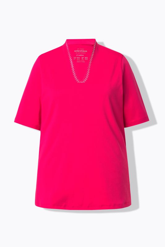 T-shirt à col cygne et manches courtes. Coupe évasée