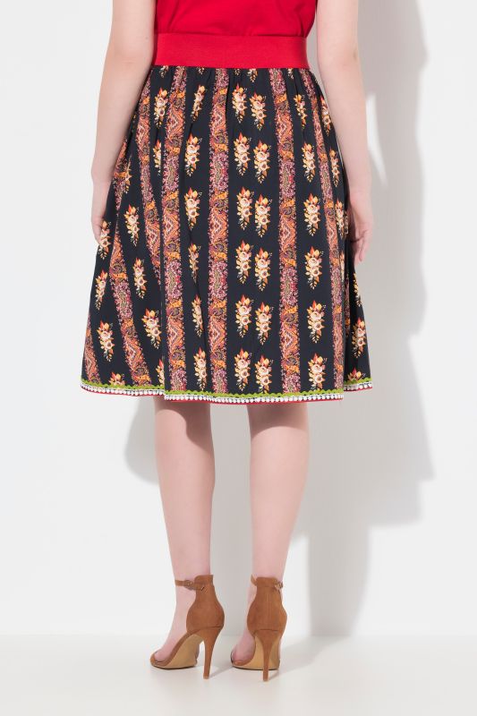 Jupe trapèze style tyrolien avec taille élastique, rubans fantaisie et dentelle