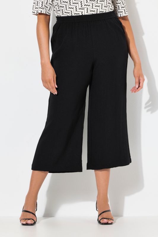 Jupe-culotte à taille élastique. Jambe large, longueur mollet