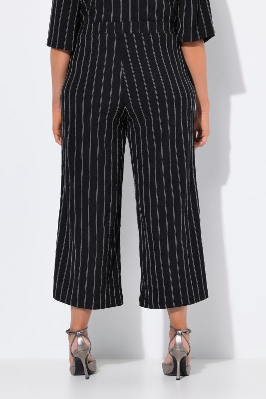 Pantalon à enfiler, taille élastique et jambe large, matière texturée