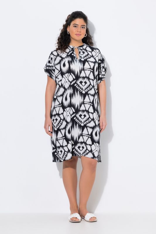 Robe oversize à col tunisien et manches courtes