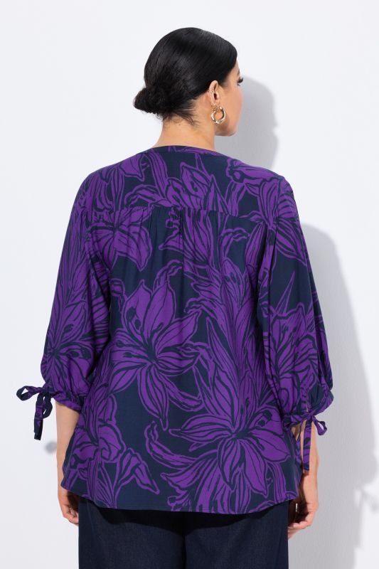 Tunique à fleurs, décolleté rond et manches 3/4, coupe évasée