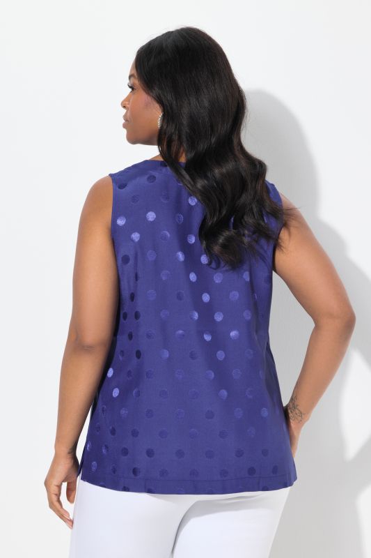 Blouse à pois jacquard avec encolure en V. Sans manches