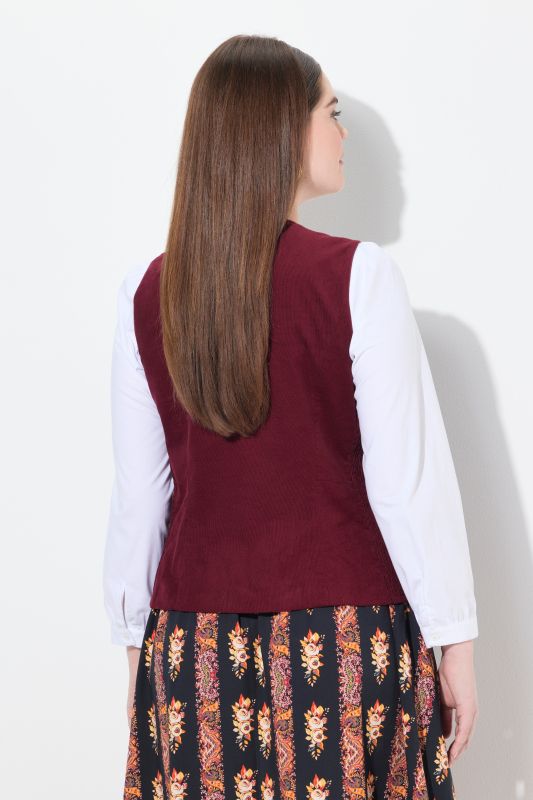Bustier inspiré du costume traditionnel tyrolien en velours smocké. Coupe Slim sans manches