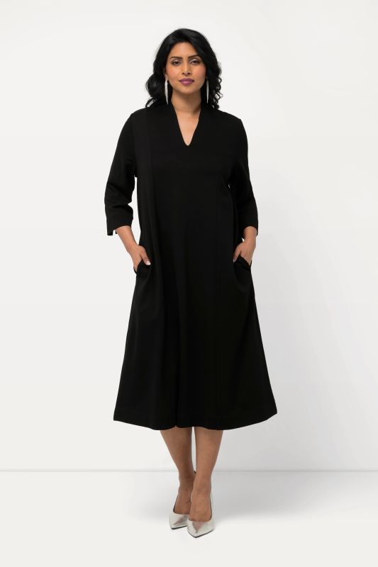 Robe midi point de Rome, manches 3/4, col calice et décolleté en V