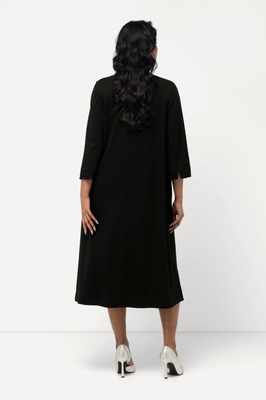 Robe midi point de Rome, manches 3/4, col calice et décolleté en V