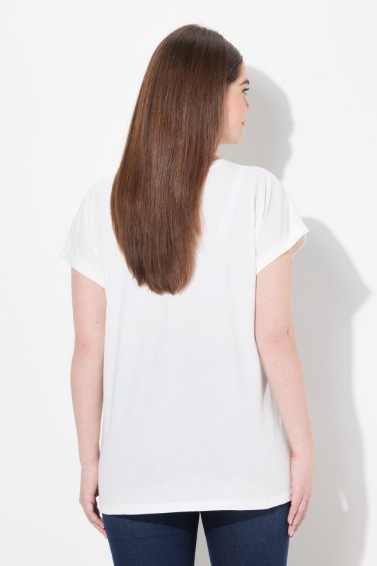 T-shirt oversize. Col rond et manches courtes. Imprimé faon