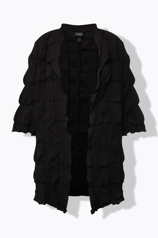 Veste à décolleté V et manches 3/4. Matière texturée 3D. Coupe évasée