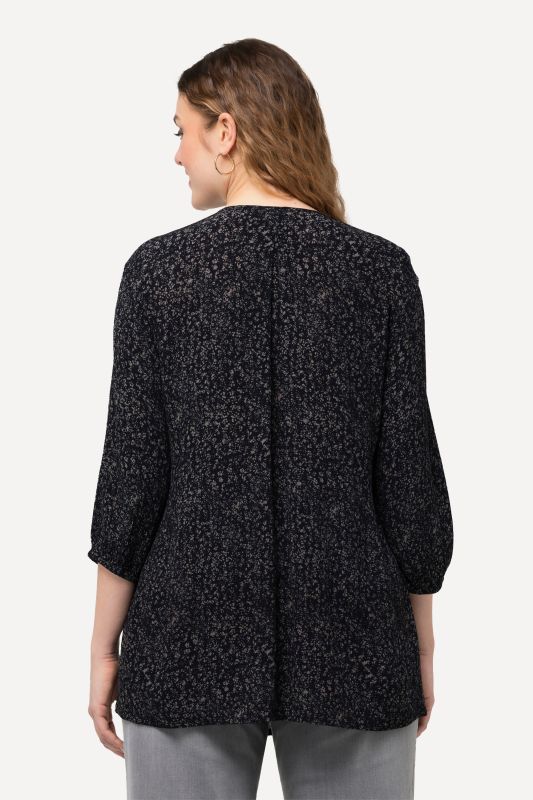 Blouse smockée à pois, décolleté rond et manches 3/4, coupe évasée