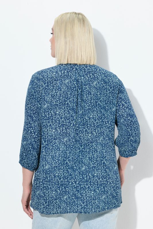 Blouse smockée à pois, décolleté rond et manches 3/4, coupe évasée