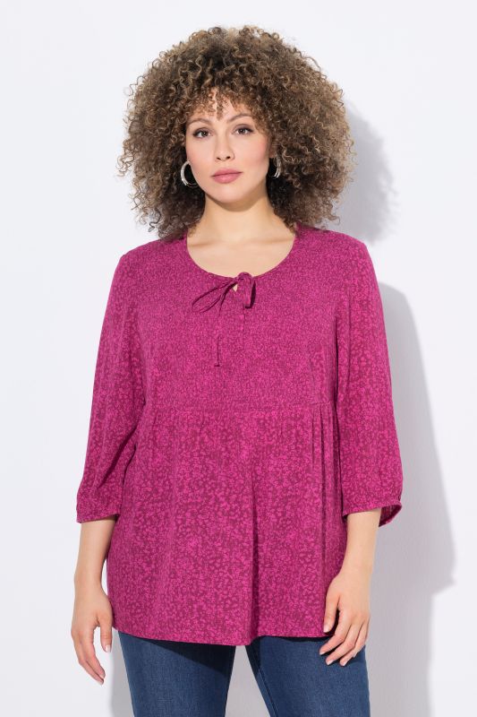 Blouse smockée à pois, décolleté rond et manches 3/4, coupe évasée