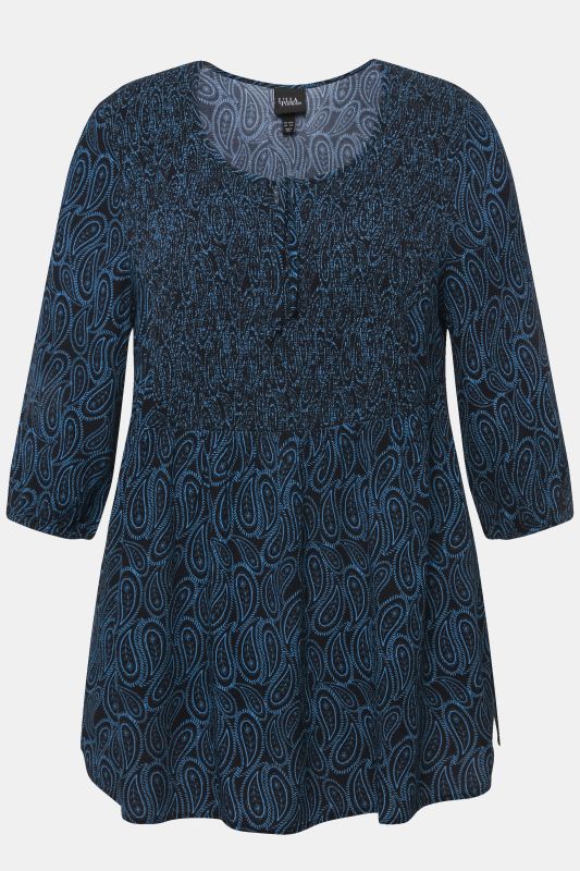 Blouse smockée avec encolure ronde et manches 3/4. Ligne A