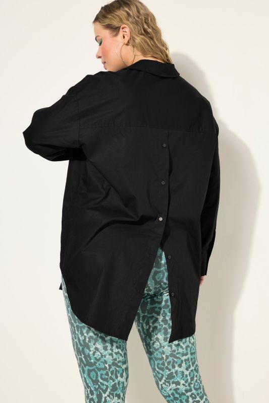 Bouse oversized à manches longues. Patte de boutonnage au dos