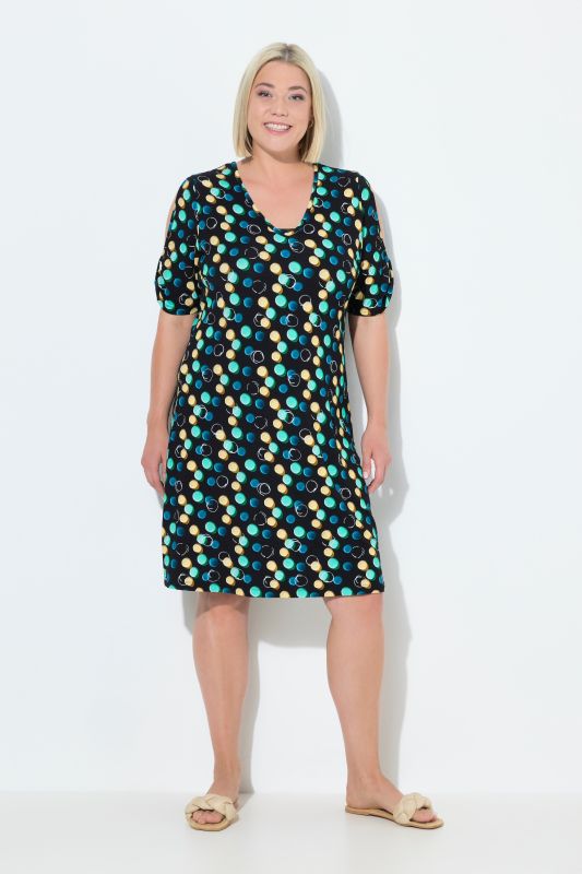 Robe de plage à pois, rubans fantaisie, décolleté en V et manches courtes