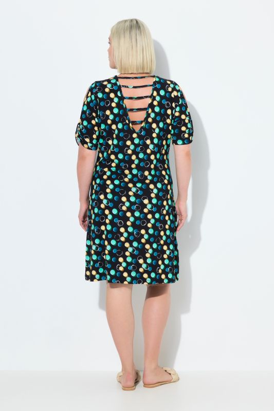 Robe de plage à pois, rubans fantaisie, décolleté en V et manches courtes