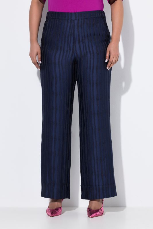 Pantalon jambe droite et large, taille confortable et matière texturée