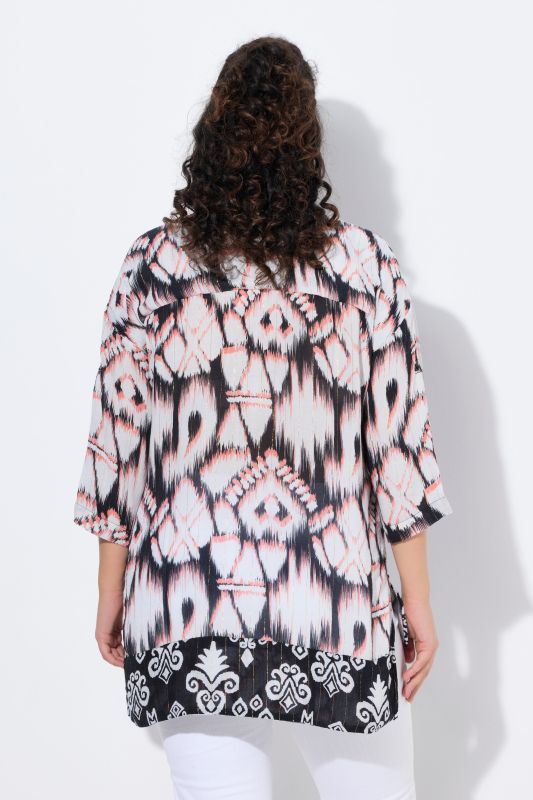 Tunique longue, col chemise, manches 3/4, plus longue dans le dos