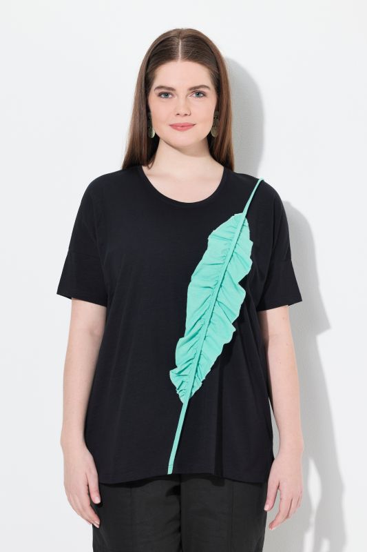 T-shirt oversize. Col rond et manches courtes. Coton bio