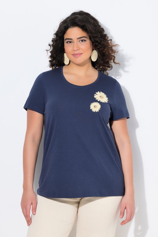 T-shirt en coton bio. Col rond et manches courtes. Motifs brodés