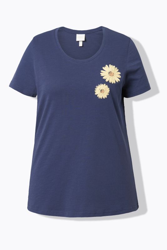 T-shirt en coton bio. Col rond et manches courtes. Motifs brodés