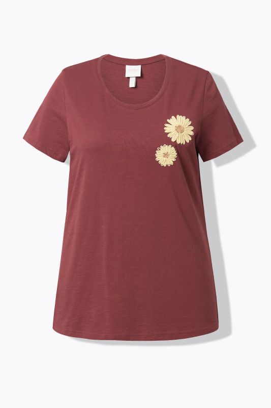 T-shirt en coton bio. Col rond et manches courtes. Motifs brodés