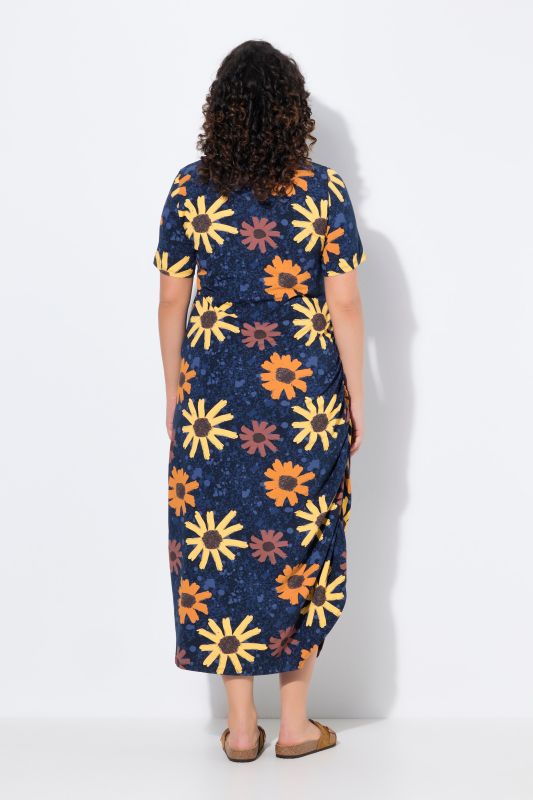 Robe maxi en jersey de coton bio. Encolure ronde et manches courtes. Motif floral