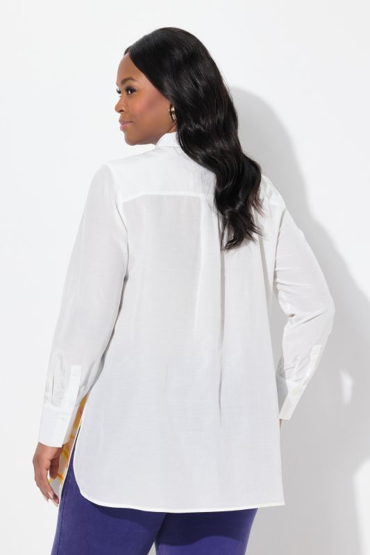 Chemisier long, coupe évasée. Col chemise et manches longues