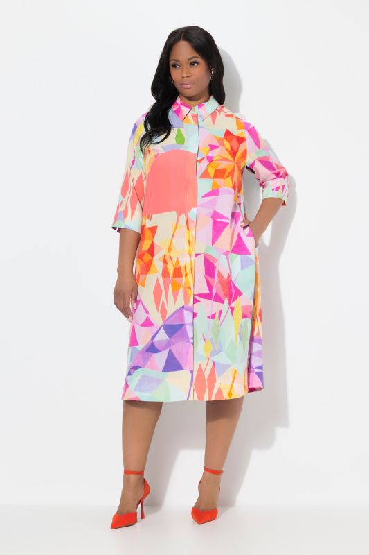 Robe midi en lyocell. Coupe évasée. Col chemise et manches 3/4