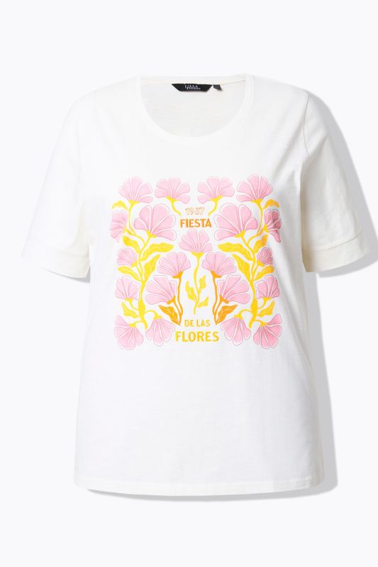 T-shirt à col rond et manches courtes. Imprimé fleurs et lettres brodées