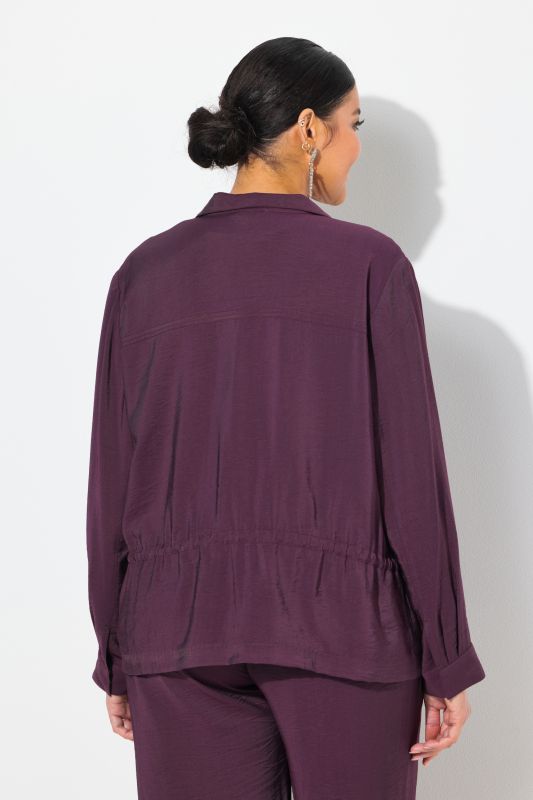 Veste en tissu « martelé », cordon coulissant, col montant et manches longues