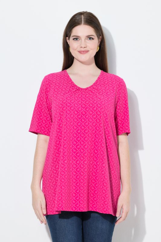 T-shirt s'inspirant des tenues traditionnelles bavaroises, encolure en V et manches courtes, coupe évasée